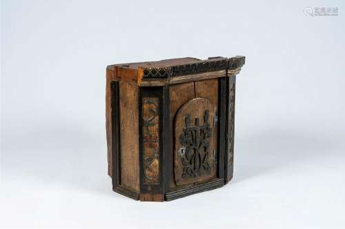 A most probably German patinated pine single-door cupboard w...