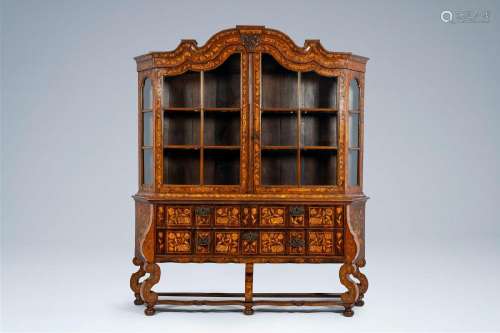A Dutch two-door display cabinet with marquetry design of fl...