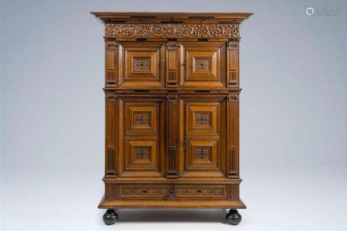 A Dutch oak Renaissance four-door cupboard, 17th C.