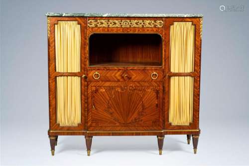A French gilt bronze mounted two-door side cabinet with gree...