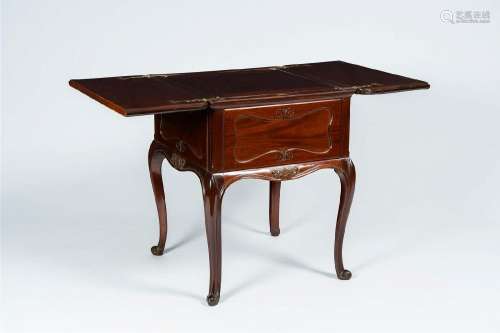 An English mahogany Mappin & Webb surprise drinks cabine...