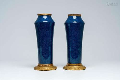A pair of French gilt bronze mounted monochrome powder blue ...