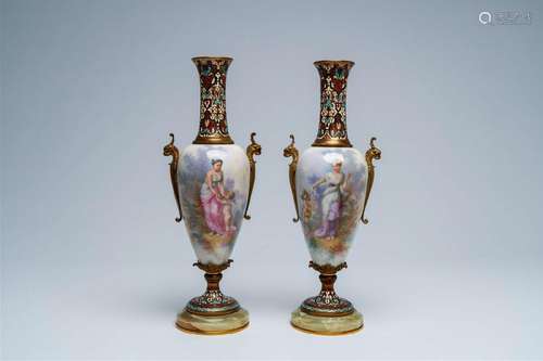 A pair of French Sèvres style bronze and champlevé mounted v...