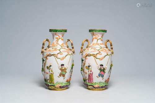 A pair of French Bayeux vases with chinoiserie relief design...