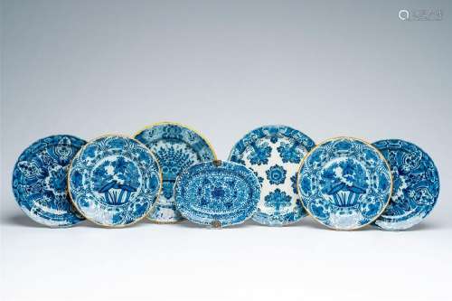 Seven Dutch Delft blue and white plates with floral design, ...