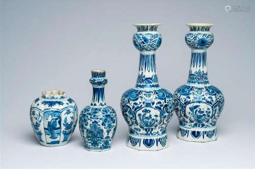 Three Dutch Delft blue and white garlic-head mouth vases wit...