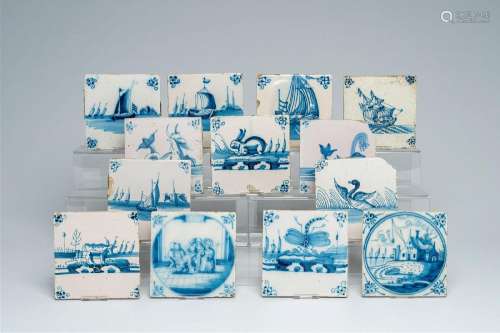 13 Dutch Delft blue and white tiles with a.o. ships and anim...