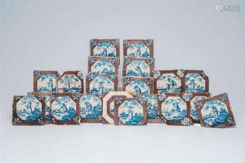 Twenty Dutch Delft blue, white and manganese tiles with figu...