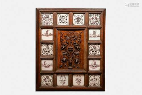 A carved wooden frame with manganese Delft tiles, 18th/19th ...