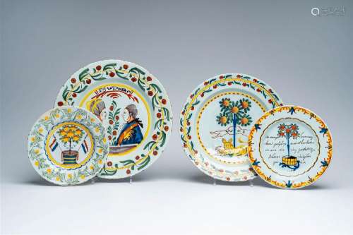 Three Dutch Delft polychrome 'orangist' dishes and a charger...