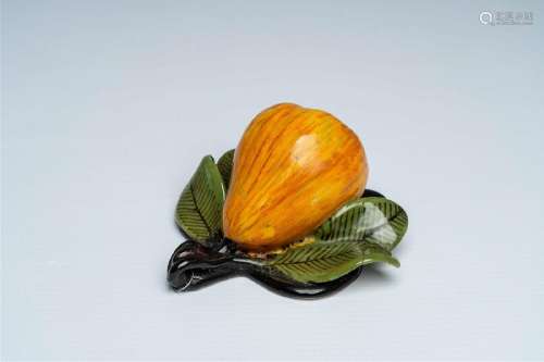 A polychrome Dutch Delft pear, 19th C.