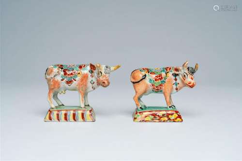 A pair of polychrome petit feu Dutch Delft cows, 18th C.