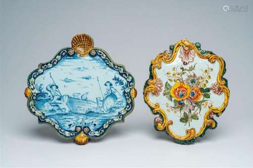 A polychrome Dutch Delft floral plaque and a blue and white ...
