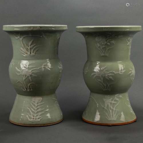 Pair of Chinese celadon glazed and white slip decorated vase...