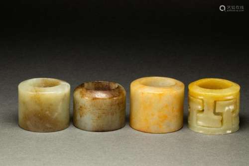 (lot of 4) Chinese jade and hardstone archer's rings
