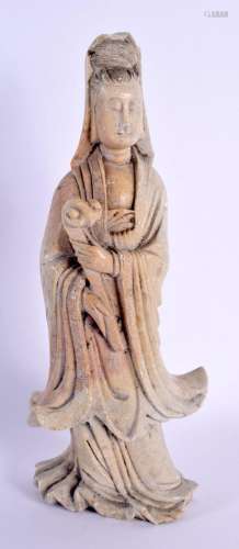 A 19TH CENTURY CHINESE CARVED SOAPSTONE FIGURE OF AN IMMORTA...