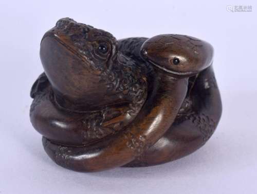 A JAPANESE CARVED BOXWOOD SNAKE AND TOAD NETSUKE. 3.5 cm x 3...