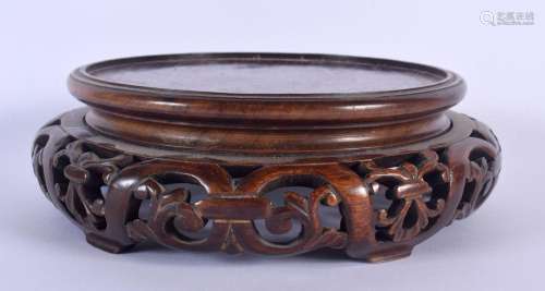 A LARGE LATE 19TH CENTURY CHINESE CARVED HARDWOOD STAND Late...