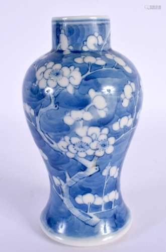 A 19TH CENTURY CHINESE BLUE AND WHITE PORCELAIN PRUNUS VASE ...