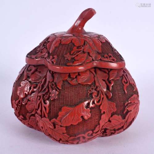 A CHINESE CARVED RED LACQUER MELON FORM BOX AND COVER 20th C...