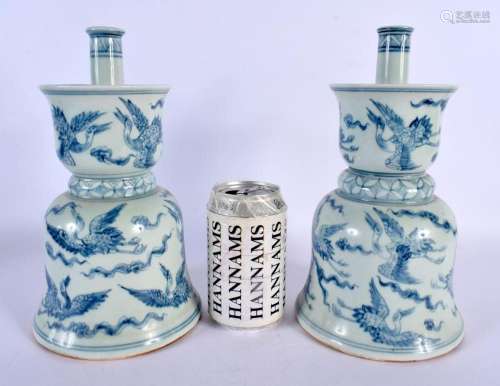 A CHINESE BLUE AND WHITE PORCELAIN ALTAR STICKS 20th Century...