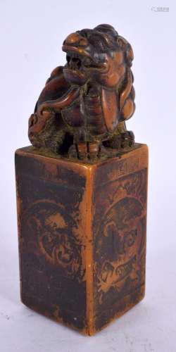 A CHINESE CARVED SOAPSTONE SEAL 20th Century. 12.5 cm high.