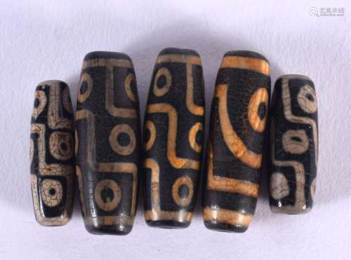 FIVE CHINESE TIBETAN AGATE ZHI BEADS 20th Century. Largest 4...