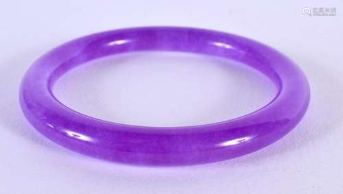 A CHINESE LAVENDER JADE BANGLE 20th Century. 8 cm diameter.