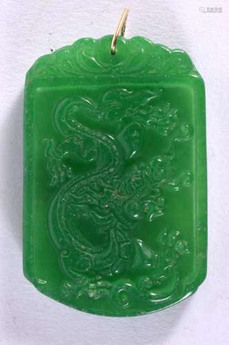 A CHINESE GOLD MOUNTED JADE PENDANT 20th Century. 5.5 cm x 4...