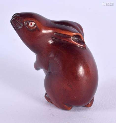 A JAPANESE CARVED BOXWOOD RABBIT NETSUKE. 4 cm x 2 cm.