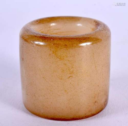 A CHINESE CARVED JADE ARCHERS RING 20th Century. 3.5 cm wide...