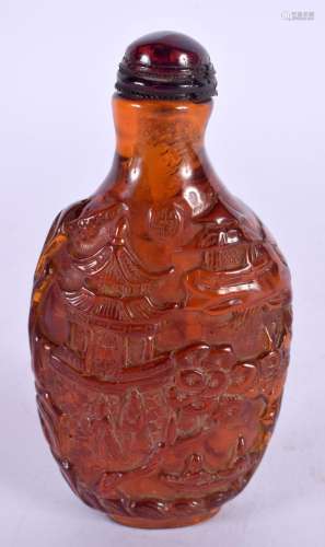 A CHINESE CARVED AMBER TYPE SNUFF BOTTLE 20th Century. 8.5 c...