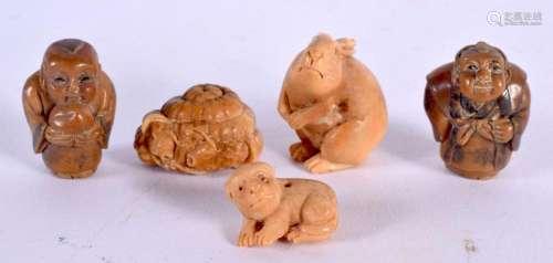 FIVE JAPANESE CARVED TAGHUA NUT NETSUKES. (5)