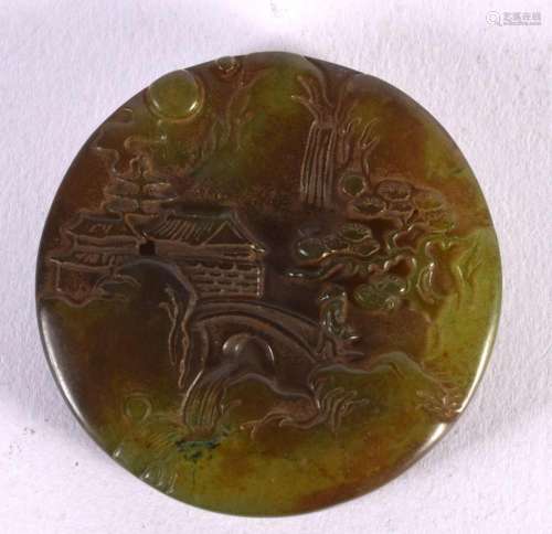A CHINESE JADE PLAQUE 20th Century. 5 cm wide.