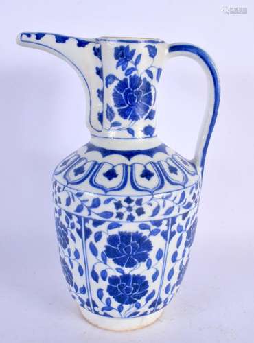 A TURKISH ISLAMIC BLUE AND WHITE WATER JUG. 27 cm high.