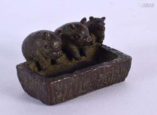 A JAPANESE BRONZE PIG TROUGH. 4.5 cm x 2 cm.