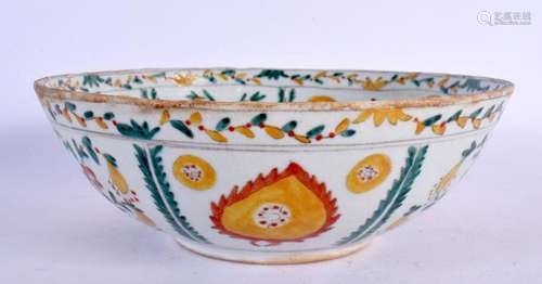 A TURKISH OTTOMAN KUTAHYA POTTERY BOWL painted with flowers....