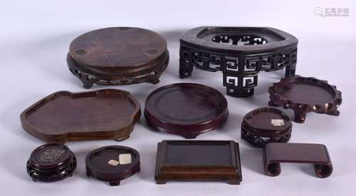 ASSORTED CHINESE HARDWOOD STANDS in various forms and sizes....