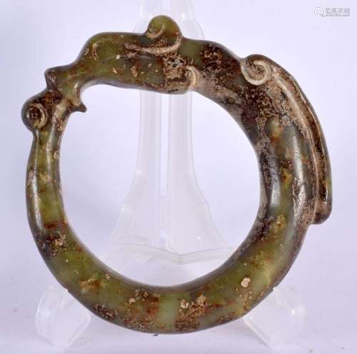 AN EARLY 20TH CENTURY CHINESE CARVED JADE PIG DRAGON BANGLE ...