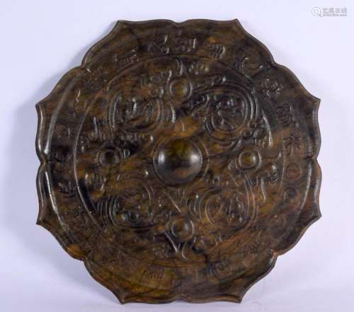 A CHINESE CARVED HARDSTONE ROUNDEL 20th Century. 16.5 cm wid...