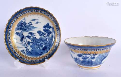 AN 18TH CENTURY CHINESE EXPORT BLUE AND WHITE SCALLOPED BOWL...