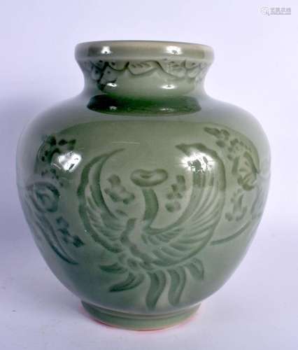 AN EARLY 20TH CENTURY CHINESE KOREAN CELADON INCISED JAR dec...