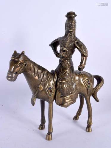 A 19TH CENTURY CHINESE BRONZE FIGURE OF GUAN DI Qing, inlaid...