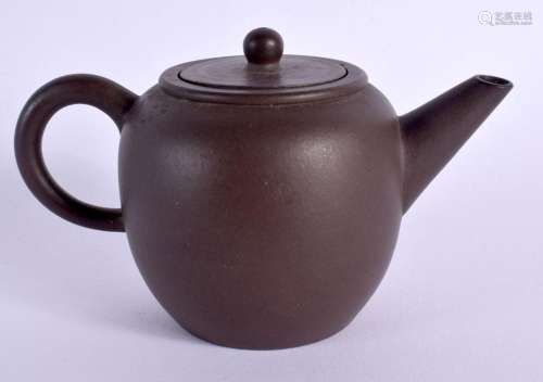 A CHINESE REPUBLICAN PERIOD YIXING POTTERY TEAPOT AND COVER....