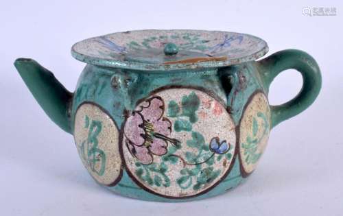 A LATE 19TH CENTURY CHINESE YIXING POTTERY TEAPOT AND COVER....