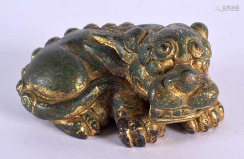 A CHINESE BRONZE SCROLL WEIGHT 20th Century, modelled as a s...