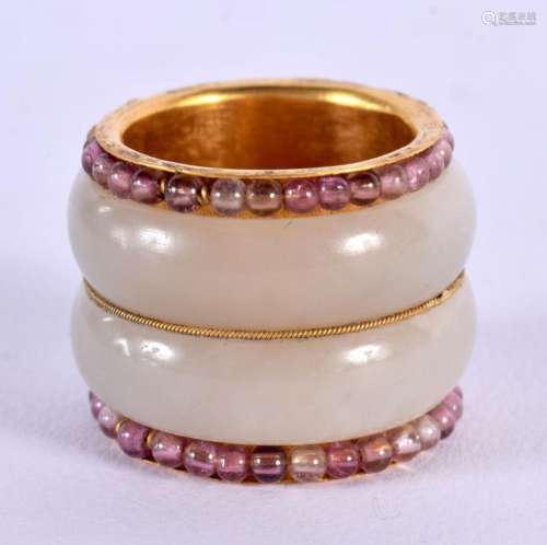 A RARE CHINESE 22CT GOLD AND WHITE JADE RING. 22 grams. 2.25...