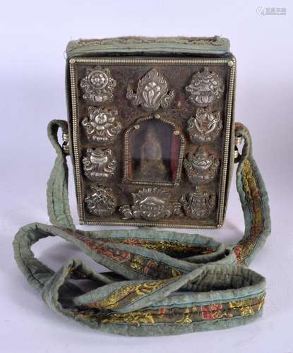 A 19TH CENTURY TIBETAN SILVER TRAVELLING BUDDHISTIC SHRINE d...