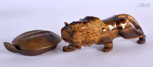 AN EARLY 20TH CENTURY CHINESE CARVED TIGERS EYE FIGURE OF A ...