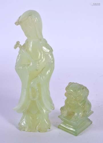 AN EARLY 20TH CENTURY CHINESE PALE GREEN JADE FIGURE OF A FE...